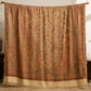 Beige pashmina wool shawl folded, showing the woven paisley detail