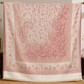 White pashmina wool shawl folded, showing the woven paisley detail