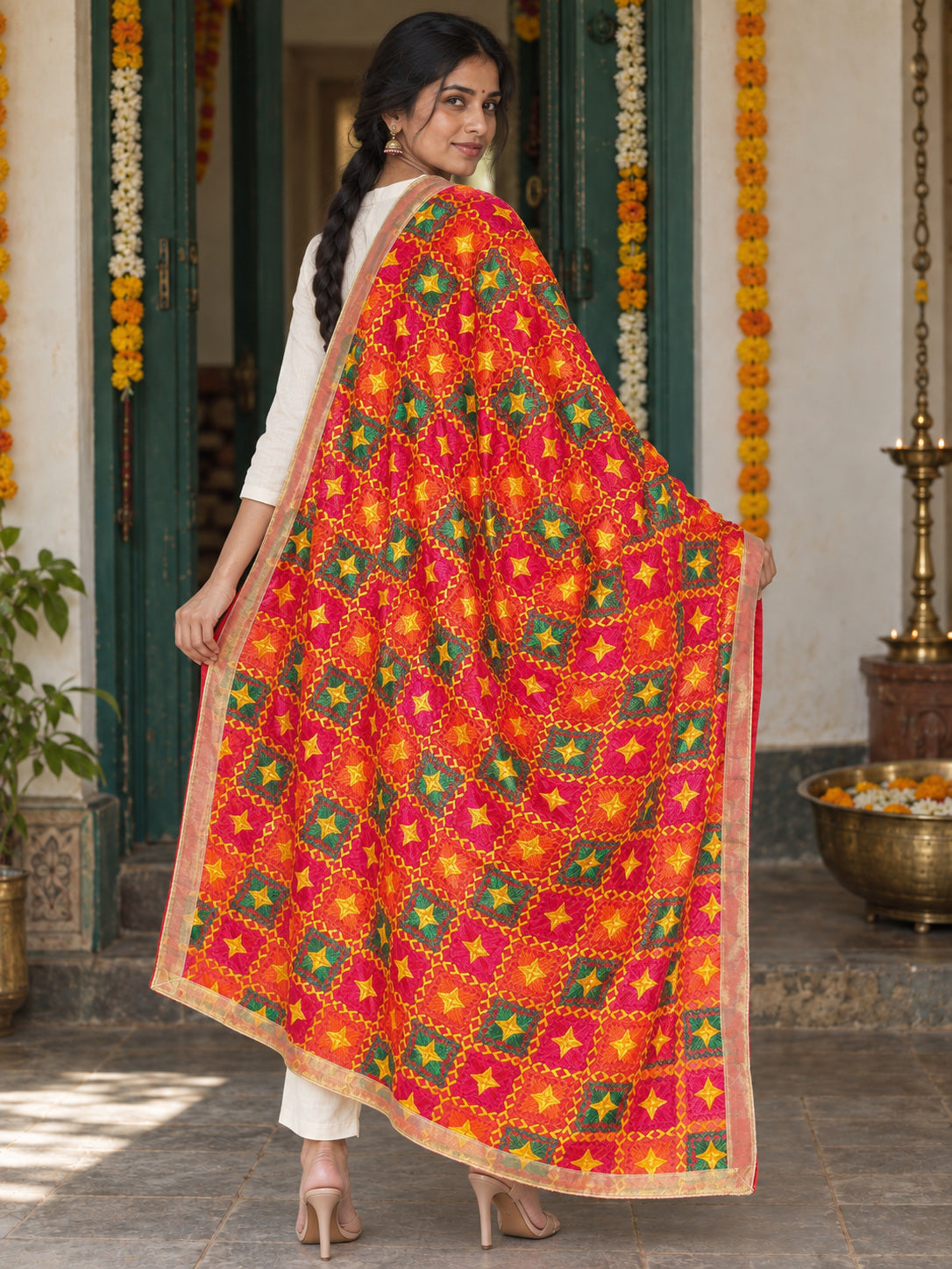 Dp2-Hv-103 — rear three-quarter drape showing Phulkari embroidery and border