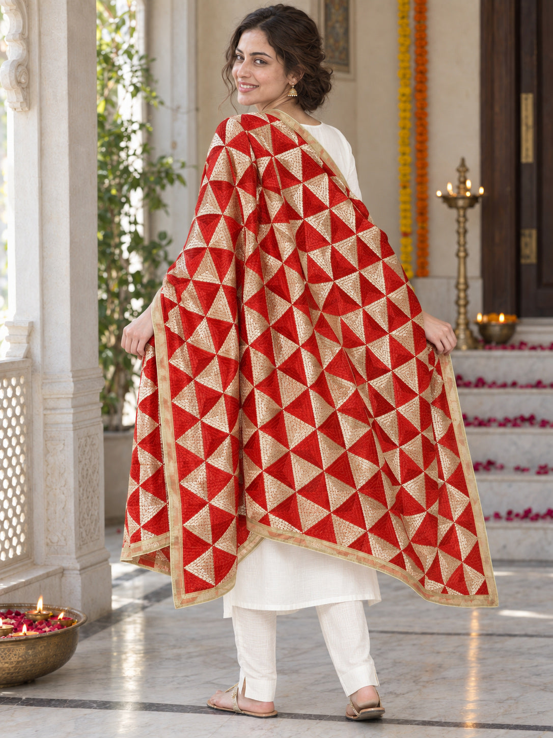 Dp2-Hv-104 — rear three-quarter drape showing Phulkari embroidery and border