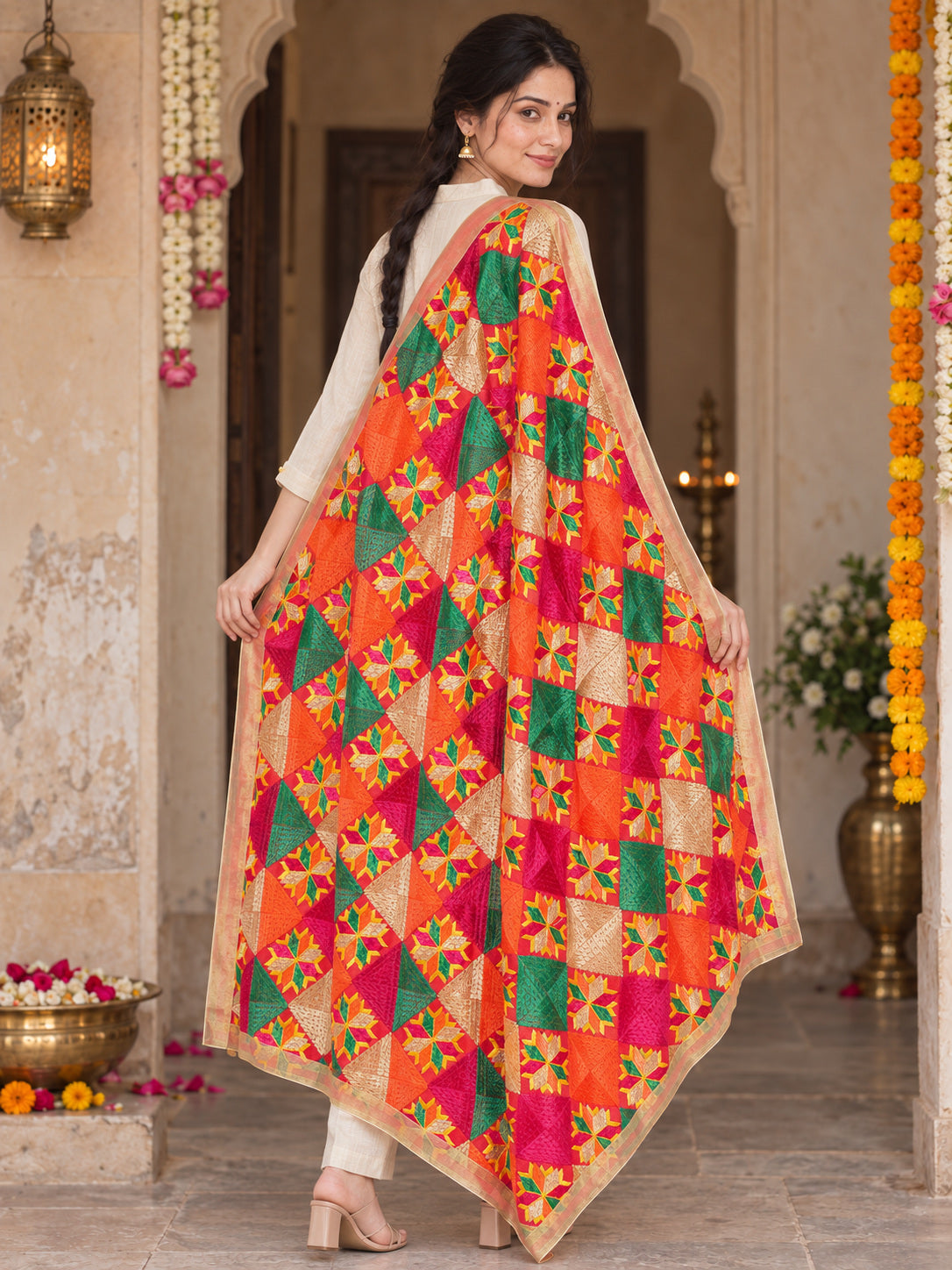 Dp2-Hv-108 — rear three-quarter drape showing Phulkari embroidery and border