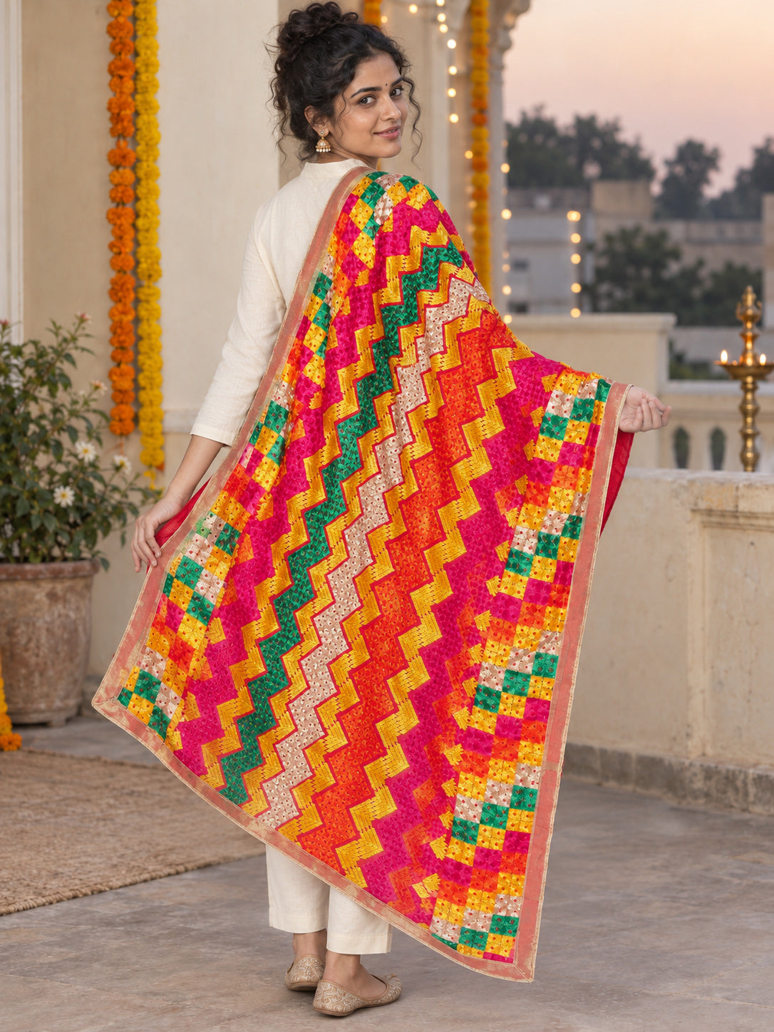 Dp2-Hv-109 — rear three-quarter drape showing Phulkari embroidery and border