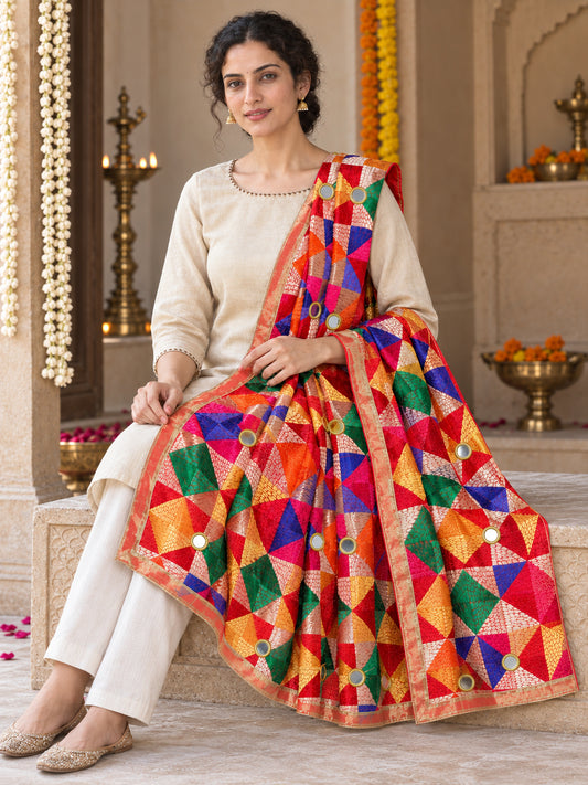 HV-PANKH-MIRROR — elegant seated Phulkari drape, festive primary portrait