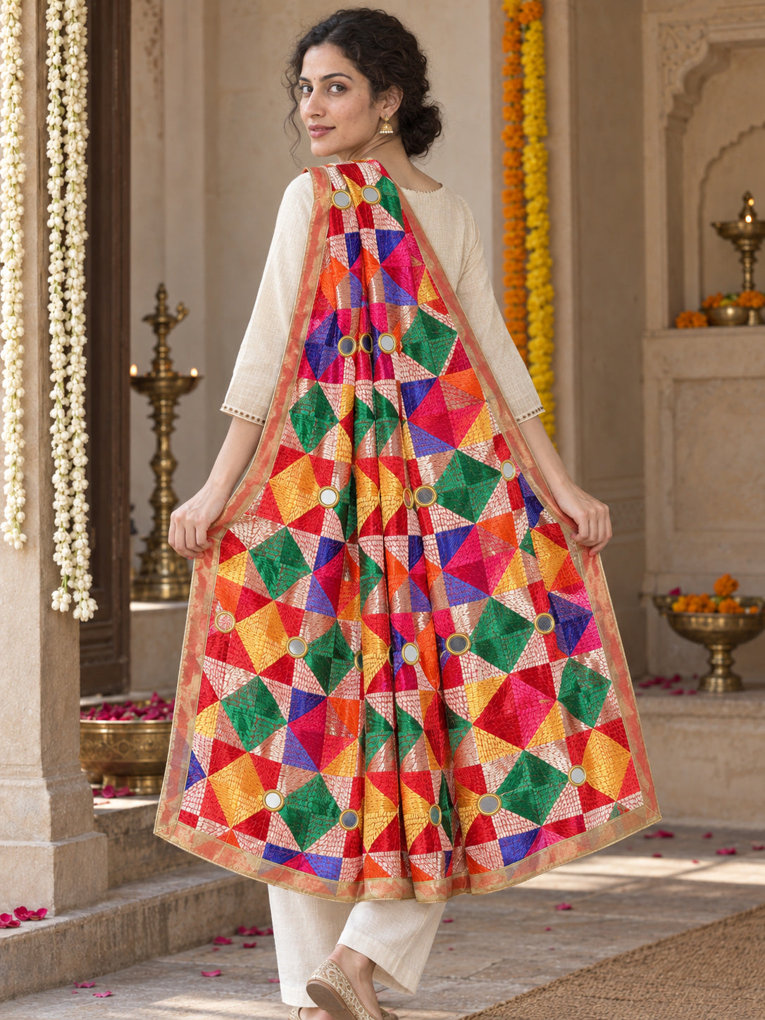 HV-PANKH-MIRROR — rear three-quarter drape showing Phulkari embroidery and border