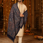 Man wearing a navy blue pashmina wool shawl