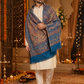 Man wearing a ferozi turquoise pashmina wool shawl