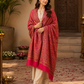 Woman wearing a pink pashmina wool shawl