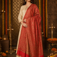 Woman wearing a maroon pashmina wool shawl