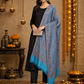 Woman wearing a ferozi turquoise pashmina wool shawl