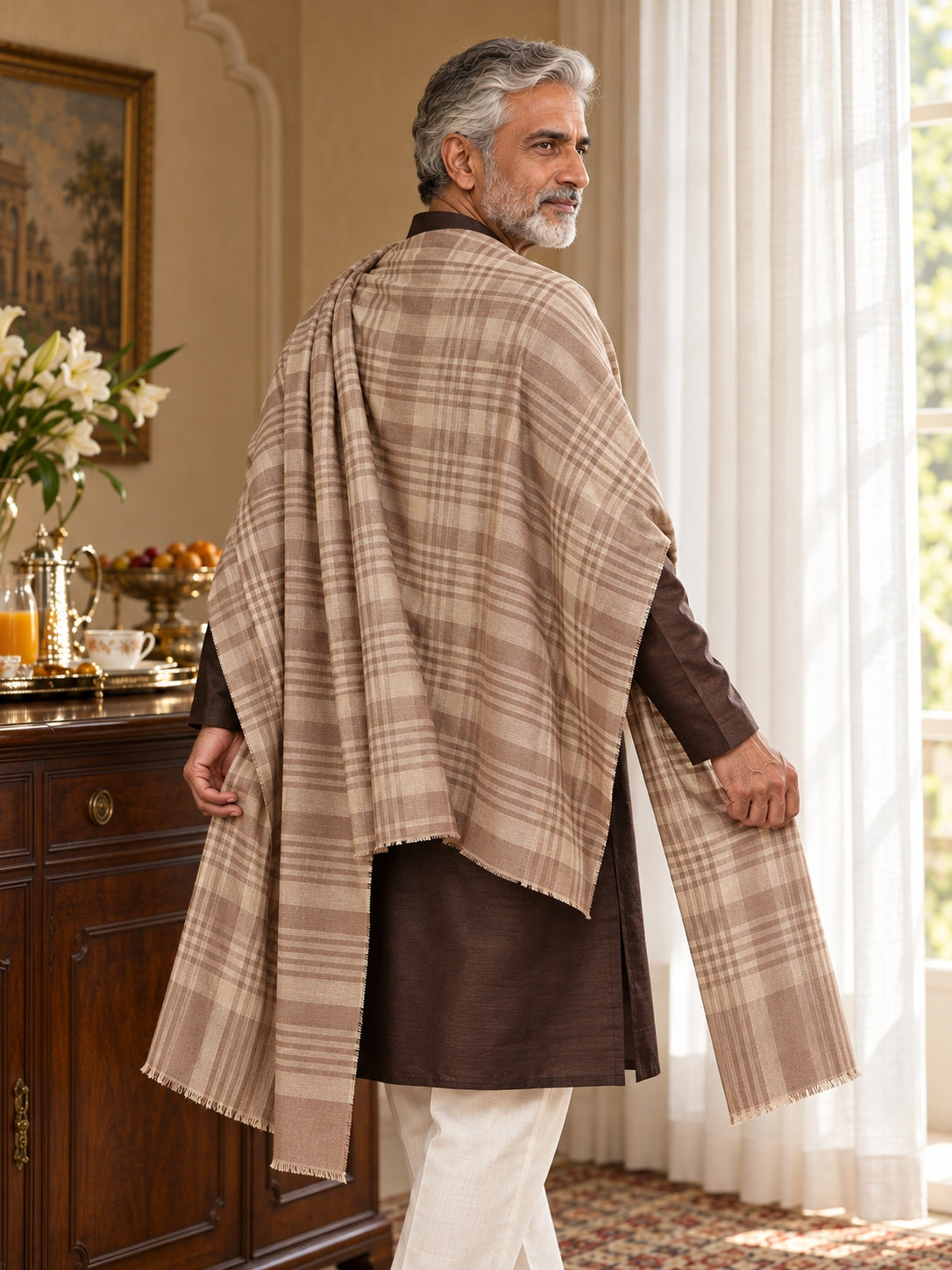 Weavers Villa MS-CHECKS-BEIGE men's shawl styled on a premium model in a royal setting, view 3.