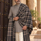 Weavers Villa MS-CHECKS-BLACK men's shawl styled on a premium model in a royal setting, view 1.