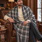 Weavers Villa MS-CHECKS-CHARCOAL men's shawl styled on a premium model in a royal setting, view 2.