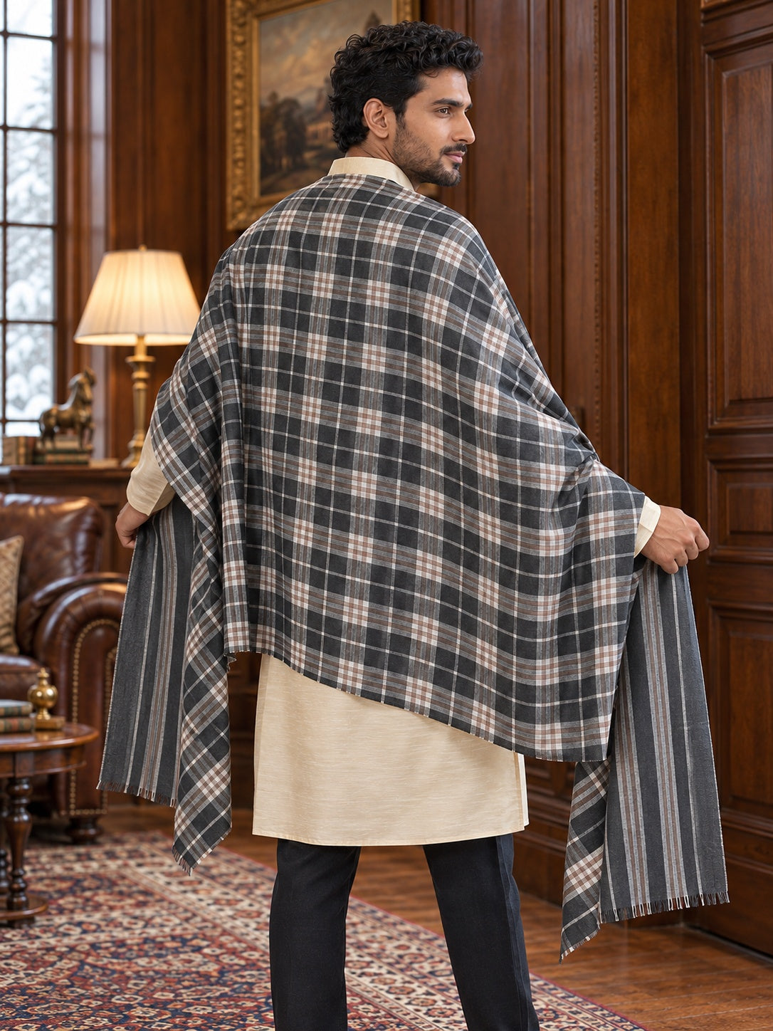 Weavers Villa MS-CHECKS-CHARCOAL men's shawl styled on a premium model in a royal setting, view 3.