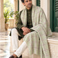 Weavers Villa MS-CHECKS-PISTA men's shawl styled on a premium model in a royal setting, view 2.