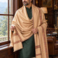Weavers Villa MS-KINAURI-DARKBEIGE men's shawl styled on a premium model in a royal setting, view 1.