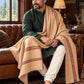 Weavers Villa MS-KINAURI-DARKBEIGE men's shawl styled on a premium model in a royal setting, view 2.