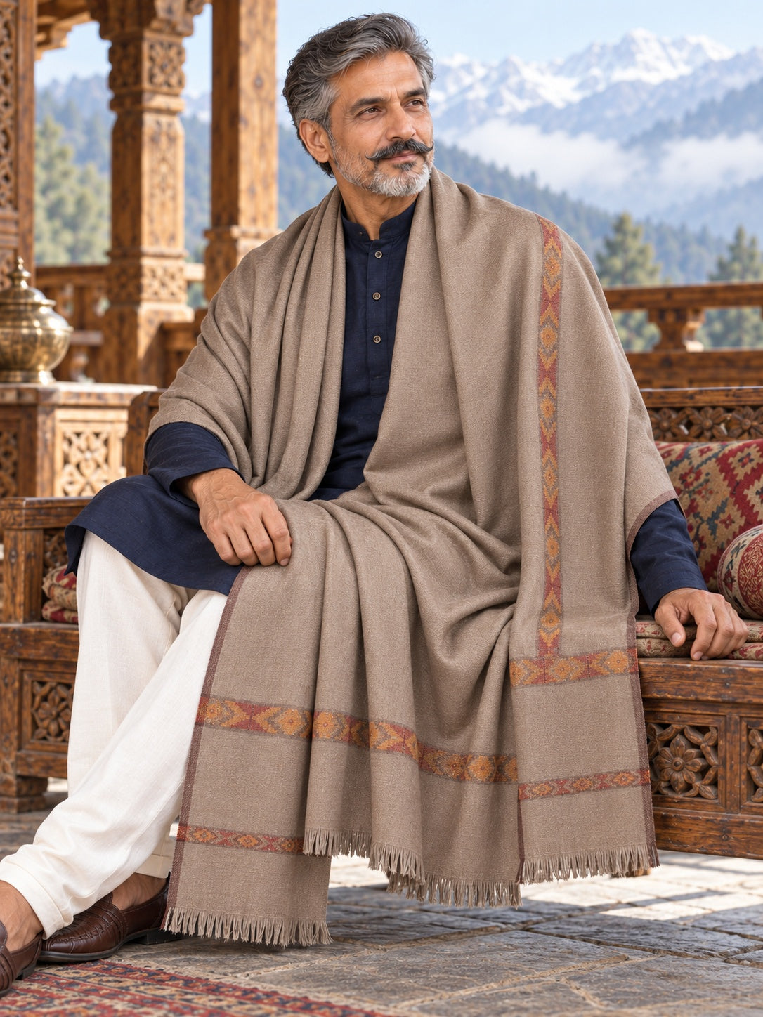 Weavers Villa MS-KINAURI-DARKGREY men's shawl styled on a premium model in a royal setting, view 2.