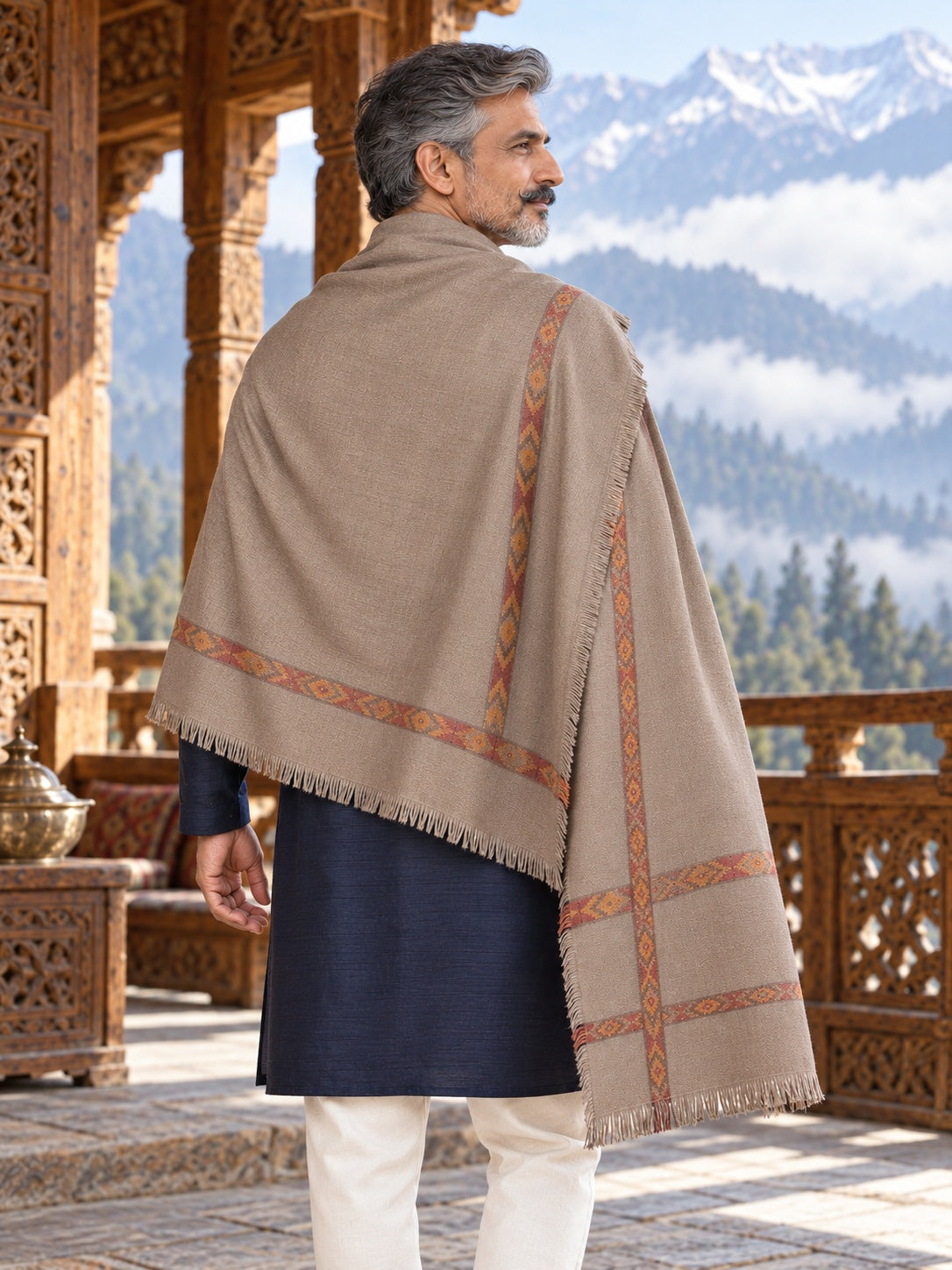 Weavers Villa MS-KINAURI-DARKGREY men's shawl styled on a premium model in a royal setting, view 3.