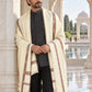 Weavers Villa MS-KINAURI-WHITE men's shawl styled on a premium model in a royal setting, view 1.