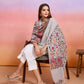 Woman sitting on a chair with a floral shawl draped over her, against a pink and orange gradient background.