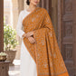 Mustard patterned shawl in an elegant one-shoulder drape with a carved haveli doorway