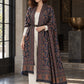 Navy Blue Kani shawl — belted wrap beside a stone gallery window | WV-401-NAVYBLUE-2