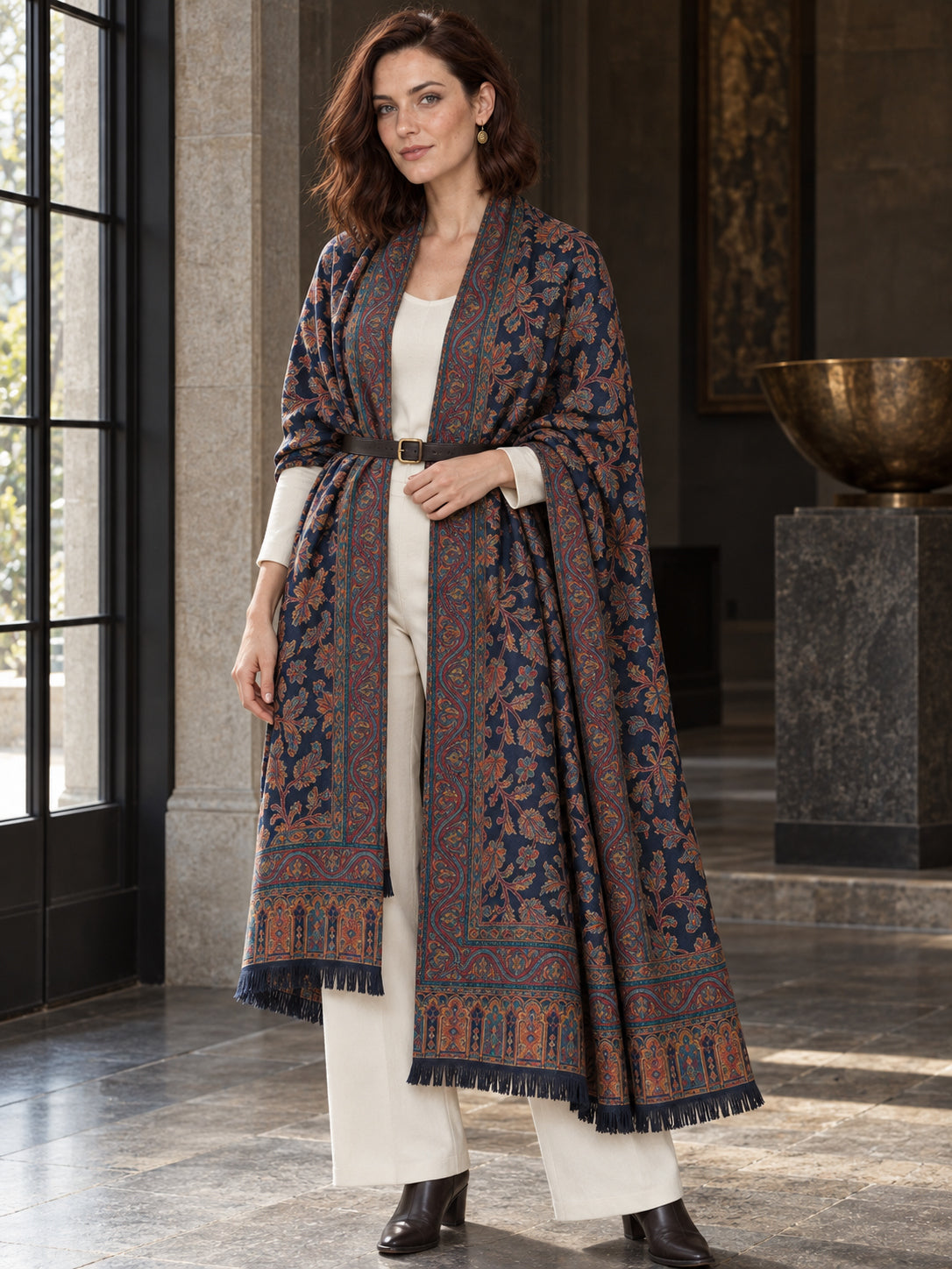Navy Blue Kani shawl — belted wrap beside a stone gallery window | WV-401-NAVYBLUE-2