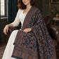 Navy Blue Kani shawl — seated wrap in a dark olive sitting room | WV-401-NAVYBLUE-4