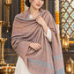 Grey paisley woven shawl styled on a model in a luxurious festive palace setting — detailed shoulder wrap