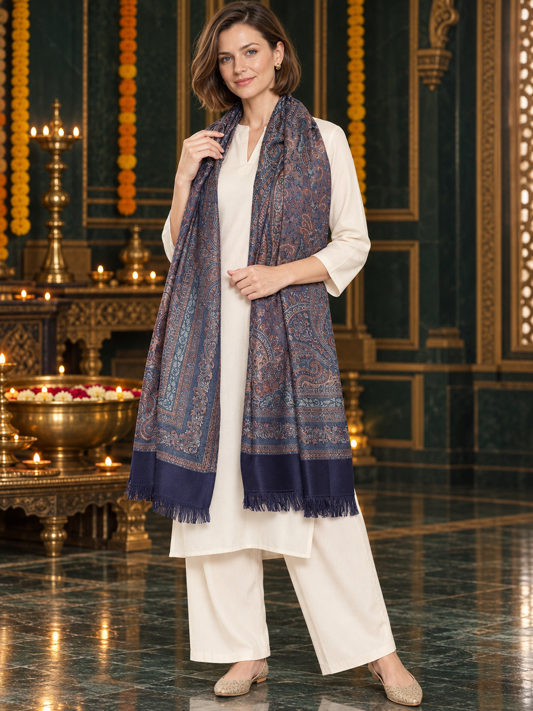 Navy Blue paisley woven shawl styled on a model in a luxurious festive palace setting — standing showcase