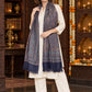 Navy Blue paisley woven shawl styled on a model in a luxurious festive palace setting — single-shoulder styling
