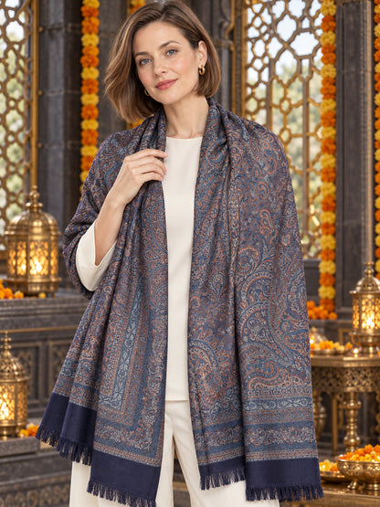Navy Blue paisley woven shawl styled on a model in a luxurious festive palace setting — detailed shoulder wrap