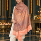 Peach paisley woven shawl styled on a model in a luxurious festive palace setting — standing showcase