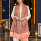 Peach paisley woven shawl styled on a model in a luxurious festive palace setting — long stole