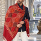 Weavers Villa MS-124-MAROON men's shawl styled on a premium model in a royal setting, view 3.