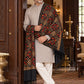 Weavers Villa MS-125-BLACK men's shawl styled on a premium model in a royal setting, view 1.