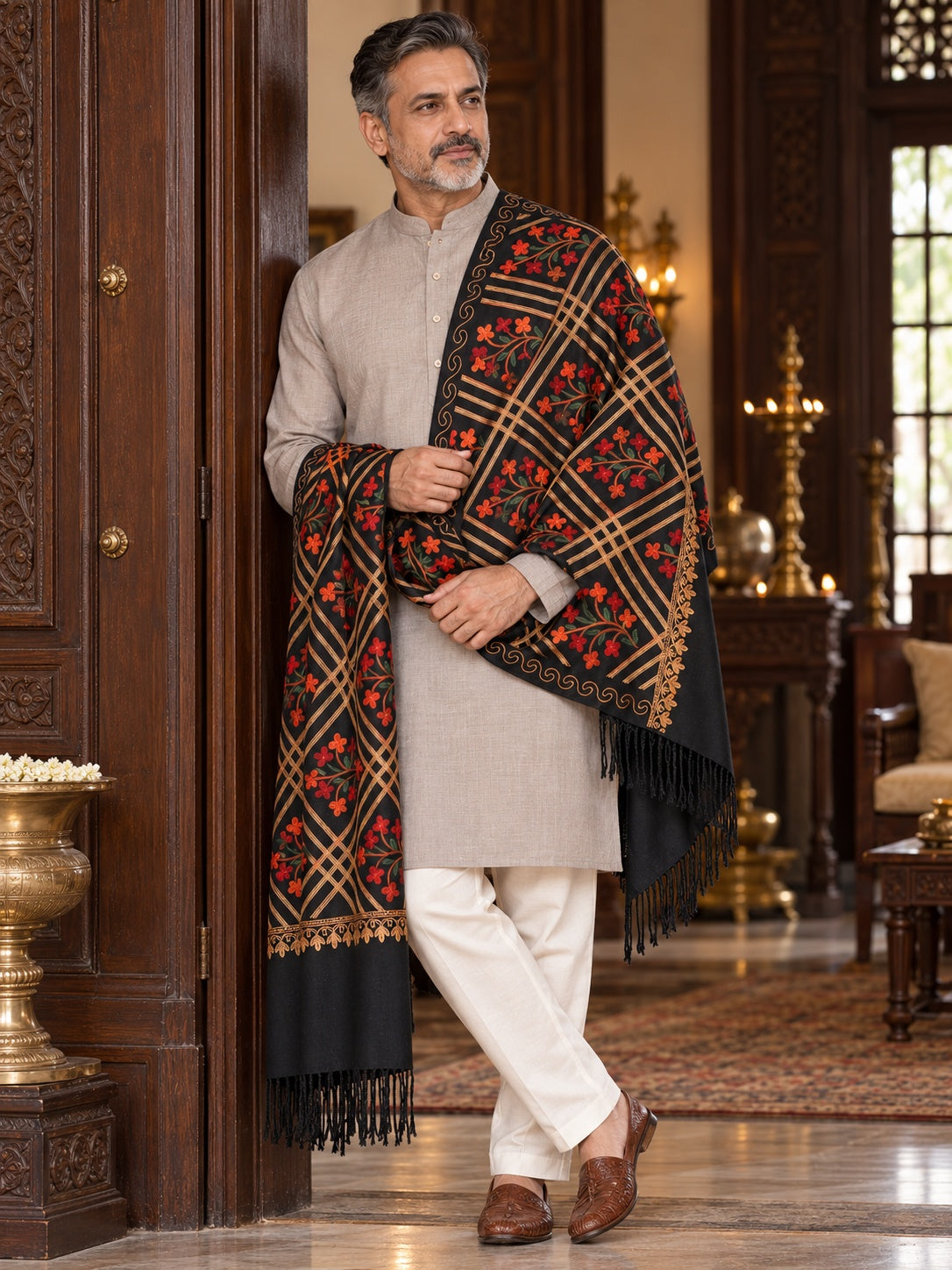 Weavers Villa MS-125-BLACK men's shawl styled on a premium model in a royal setting, view 1.