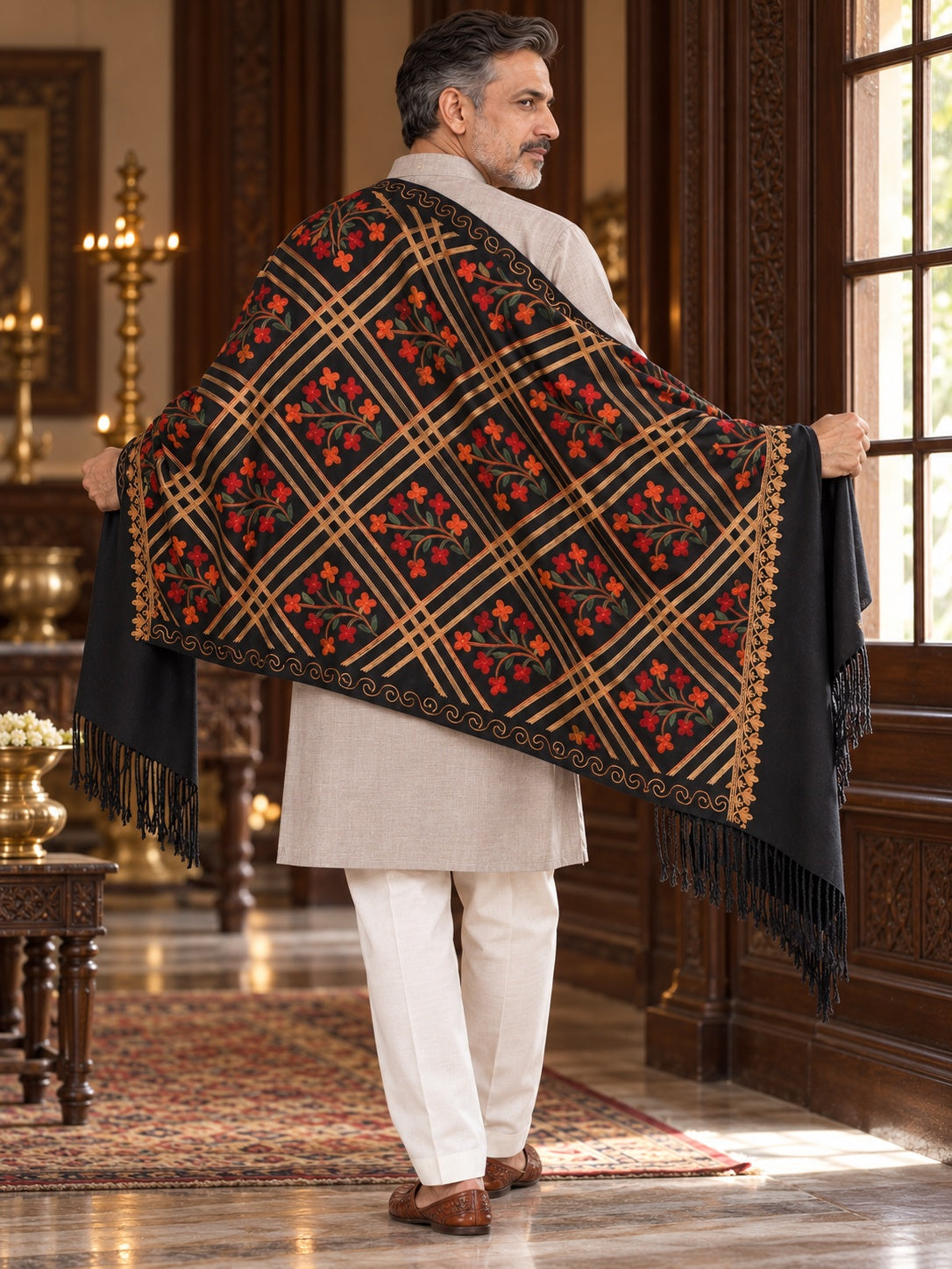 Weavers Villa MS-125-BLACK men's shawl styled on a premium model in a royal setting, view 3.