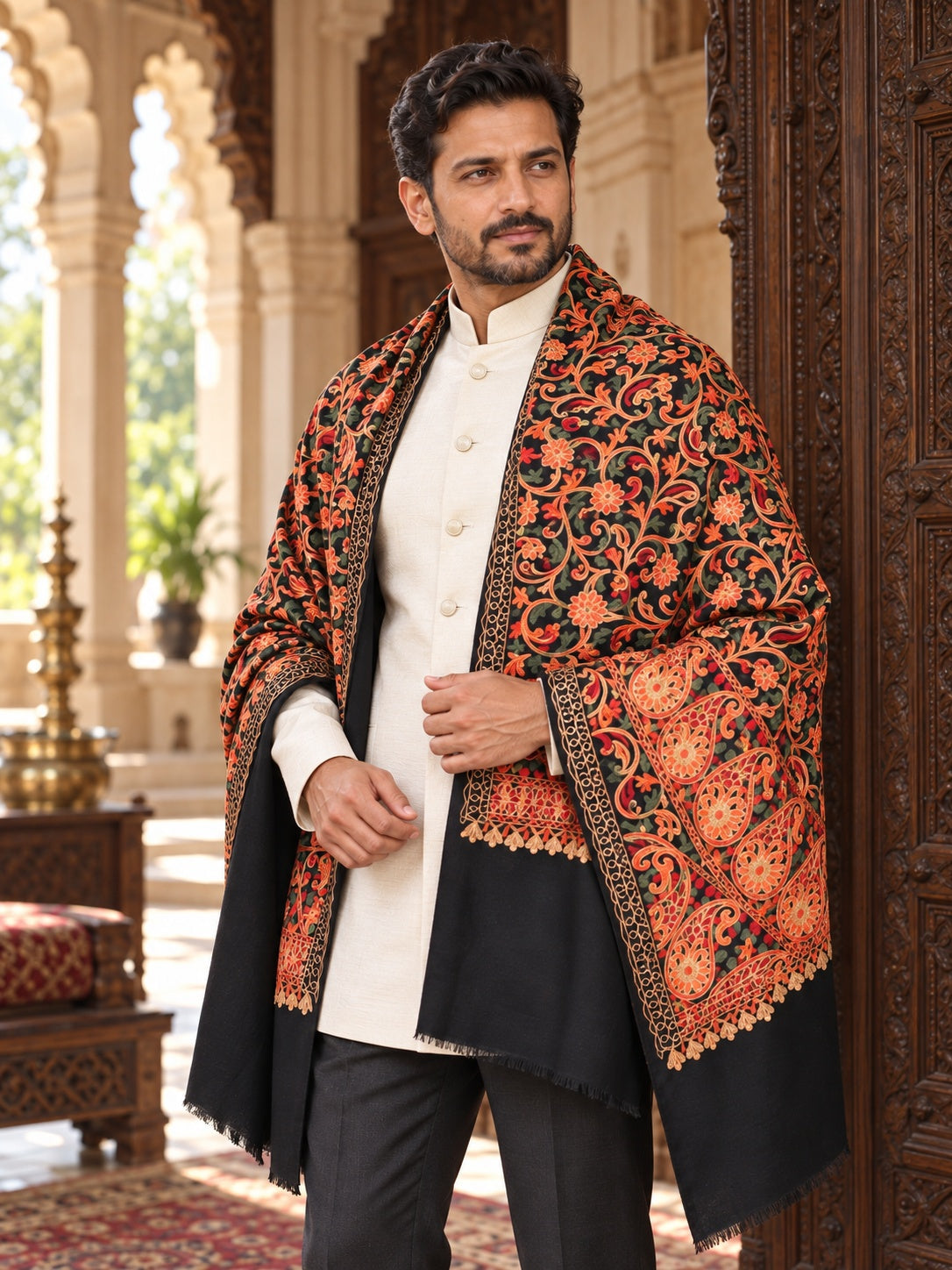 Weavers Villa MS-133-BLACK men's shawl styled on a premium model in a royal setting, view 2.