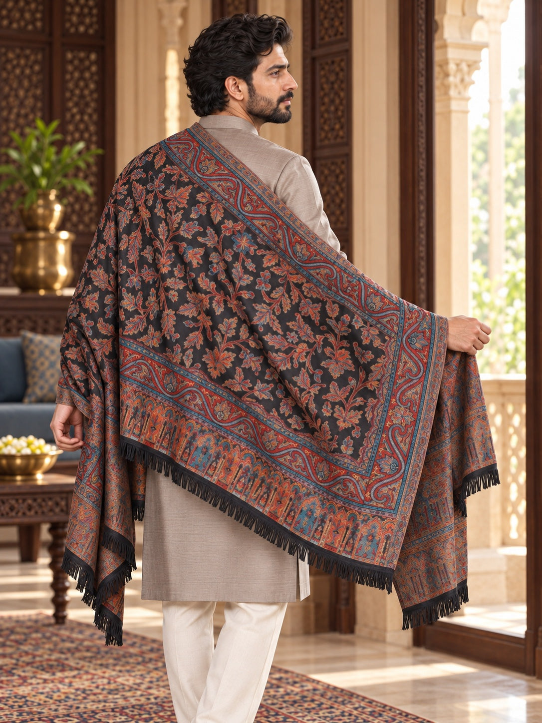 Weavers Villa MS-401-BLACK men's shawl styled on a premium model in a royal setting, view 4.