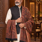 Weavers Villa MS-406-BLACK men's shawl styled on a premium model in a royal setting, view 4.