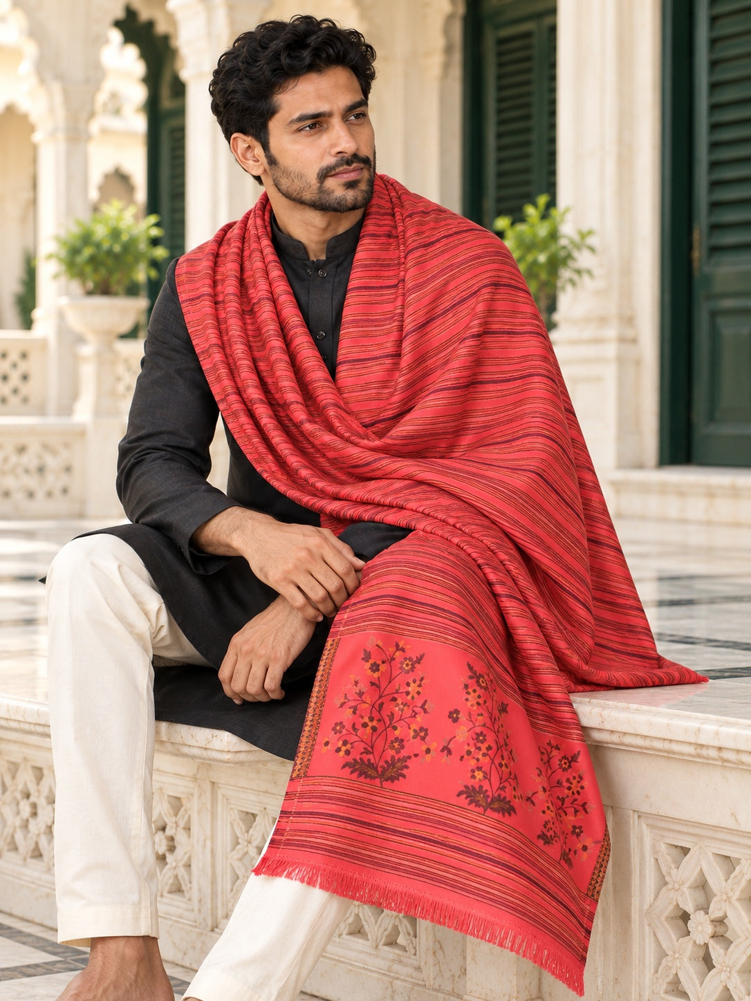 Weavers Villa MS-512-GAJARI men's shawl styled on a premium model in a royal setting, view 2.