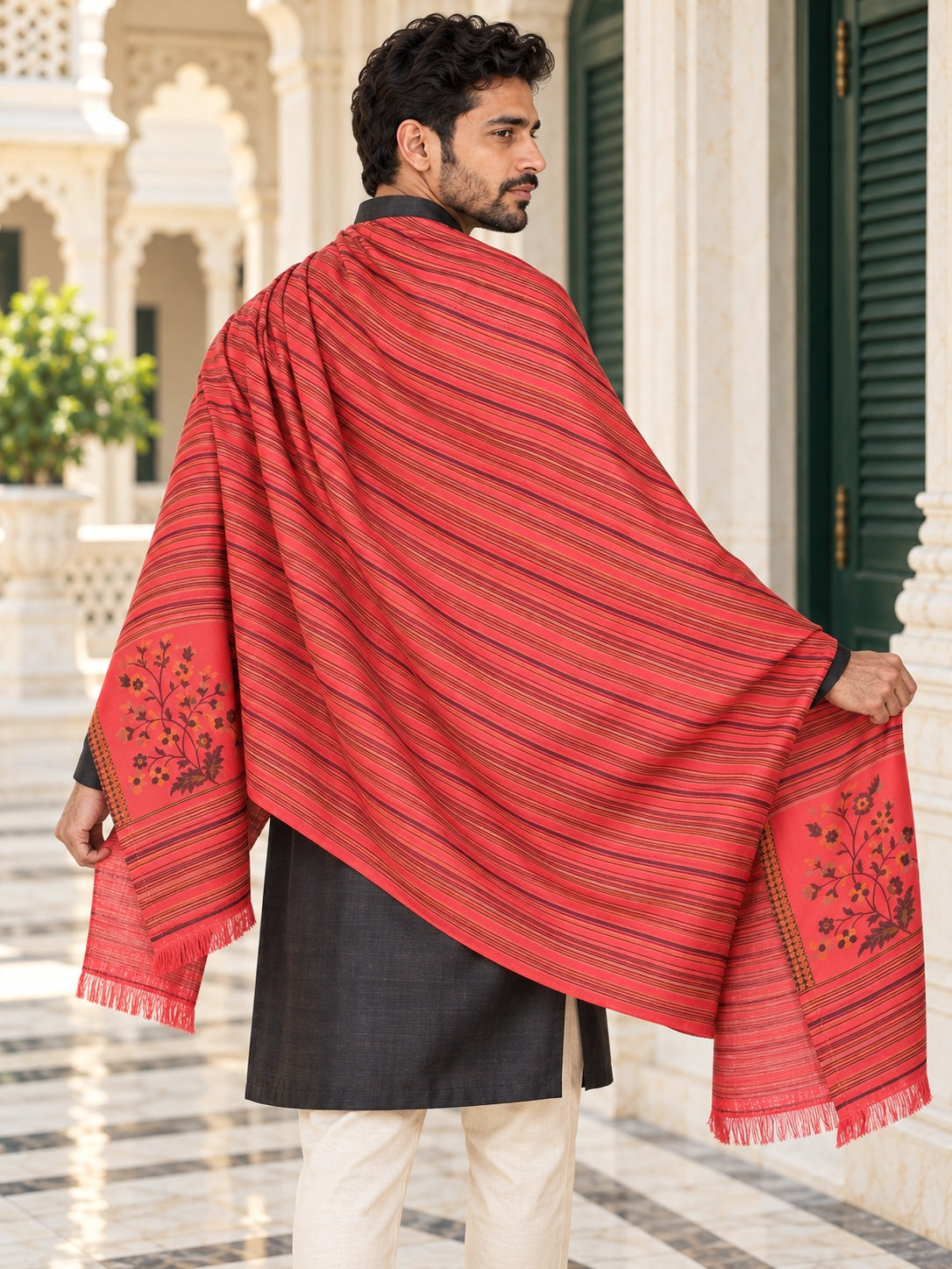 Weavers Villa MS-512-GAJARI men's shawl styled on a premium model in a royal setting, view 3.