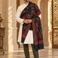 Weavers Villa MS-514-BLACK men's shawl styled on a premium model in a royal setting, view 1.