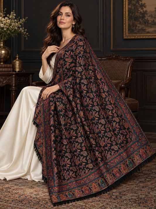 Black Kani shawl styled in a seated shoulder drape in a dark heritage salon | WV-401-BLACK-1